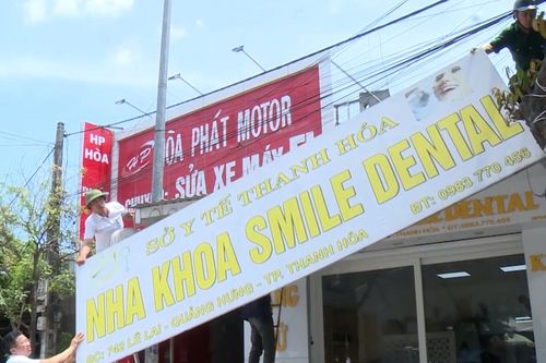 Tháo dỡ biển bảng 2 cơ sở nha khoa hoạt động 'chui'