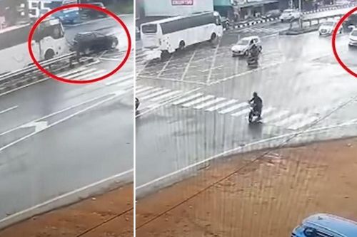Ô tô con dừng đèn đỏ ở ngã tư bị xe khách húc văng