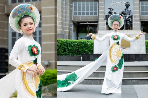Người mẫu 12 tuổi diễn áo dài nặng 250kg trên đất Thái
