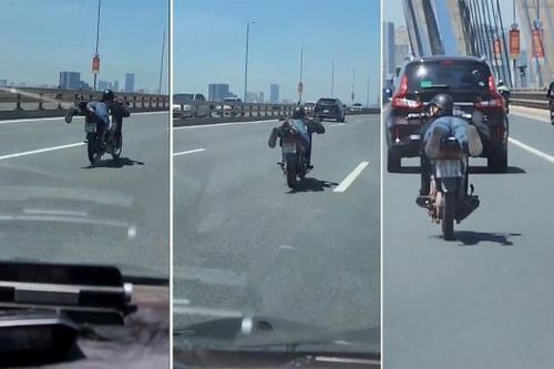 Nam thanh nằm rạp trên yên xe, vít ga trên cầu Nhật Tân