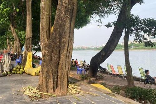 Vỉa hè, đường dạo quanh hồ: 'Đặc quyền' của ai?