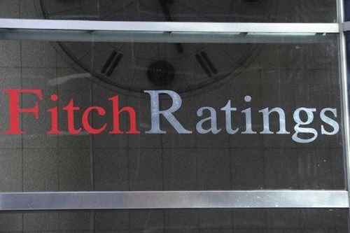 Mỹ 'nổi đóa' khi bị Fitch hạ bậc xếp hạng nợ