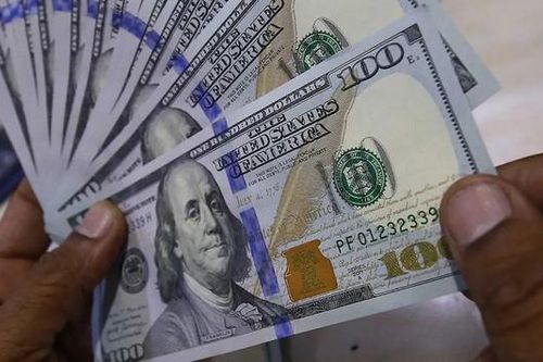 Giá vàng tiếp đà giảm, USD trượt khỏi mức đỉnh bốn tuần