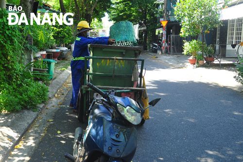 Người công nhân môi trường cần mẫn