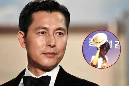 Jung Woo Sung đội nón lá, cúi chào fan Việt khi đi quảng bá phim