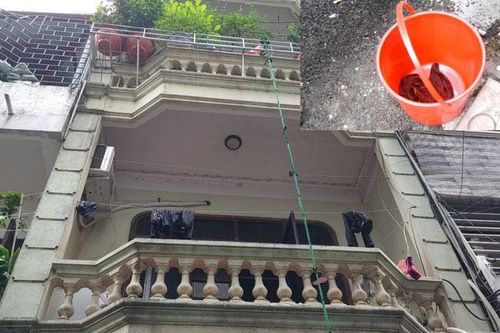 Cháy nhà, bà đặt cháu 5 tháng tuổi vào xô nhựa rồi dòng dây thả xuống