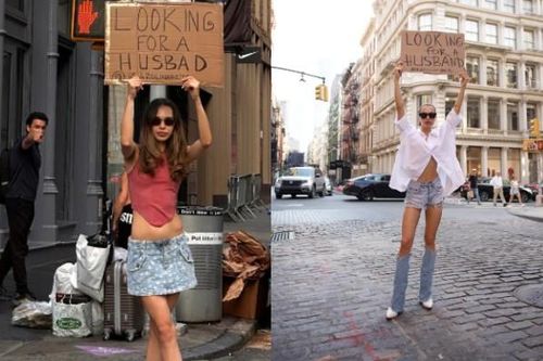 Giơ cao tấm biển 'tìm chồng' giữa phố đông người, cô gái nhận cái kết ngọt ngào