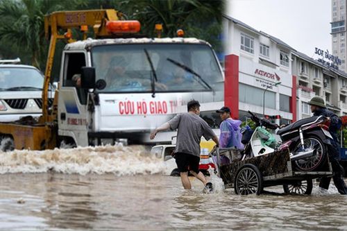 Hà Nội mưa ngập kín lối, một nghề đặc biệt 'hốt bạc' lên ngôi