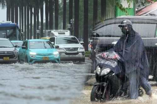 Hà Nội: Mưa xối xả khiến nhiều tuyến phố ngập thành sông, người dân chật vật di chuyển