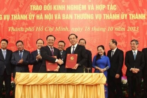 Thành phố Hồ Chí Minh và Hà Nội trao đổi kinh nghiệm, hợp tác toàn diện trên các lĩnh vực