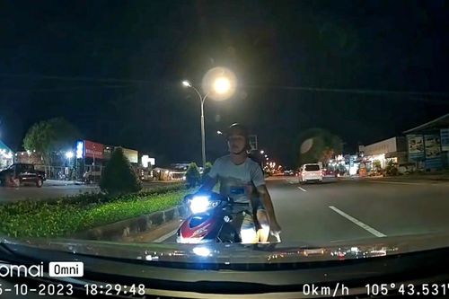 Thanh niên đi xe máy ngược chiều, ngang ngược chặn đầu ô tô còn thách thức