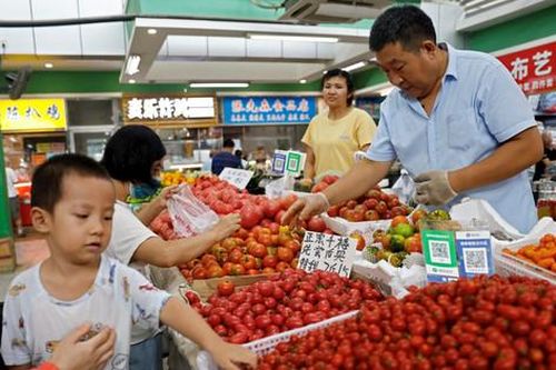 Kinh tế Trung Quốc phục hồi vượt kỳ vọng