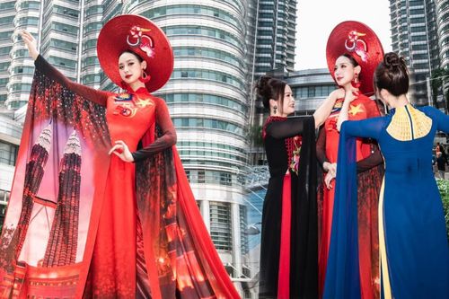 Bảo Ngọc diện áo dài rực đỏ, khoe chiều cao 'đụng nóc nhà' bên tháp đôi Malaysia