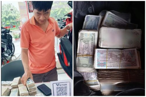 'Ông chồng của năm' mang 11kg tiền lẻ đi mua xe máy tặng vợ