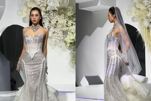 Hoa hậu Tiểu Vy gặp sự cố khi đang diễn, phải chạy vào cánh gà nhờ hỗ trợ
