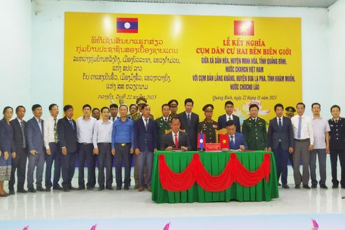 Ký kết nghĩa cụm dân cư hai bên biên giới Việt Nam - Lào