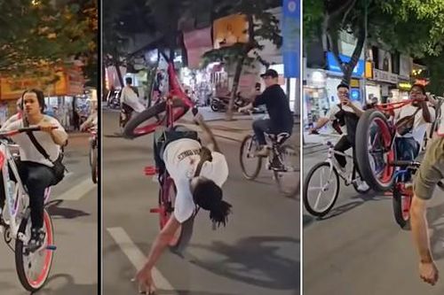 Nhóm người nước ngoài đi xe đạp bốc đầu, đánh võng trên đường phố Hà Nội