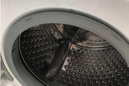 Mẹo vệ sinh máy giặt lồng ngang tại nhà mà không cần đến thợ