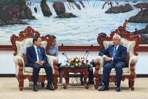Tăng cường hợp tác giữa báo Nhân Dân với báo Pasaxon của Lào