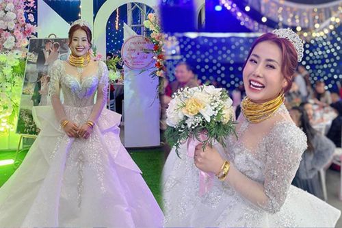Cô dâu gây sốt MXH khi đeo hàng chục kiềng vàng kín cổ, dân tình liên tục xin 'nhả vía'