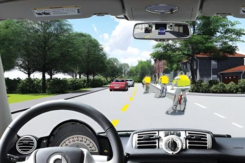 Lái xe xử lý thế nào khi vượt qua đoàn người đi xe đạp có tổ chức?