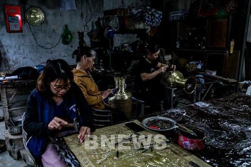 Tinh hoa chạm bạc Đồng Xâm