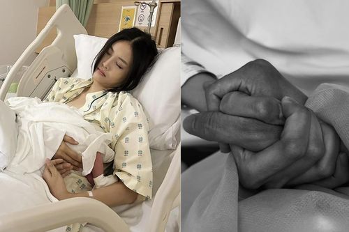 Trương Mỹ Nhân nắm chặt tay chồng, thấm mệt khi sinh con lần hai