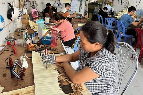 Người thổi hồn vào tranh Tết