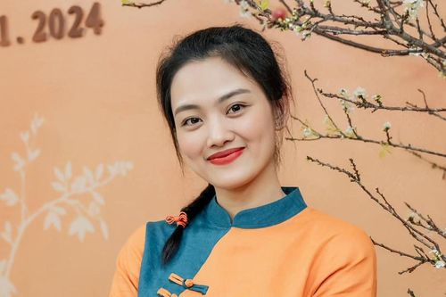 Hoa khôi bóng chuyền Thu Hoài cực xinh đón Tết