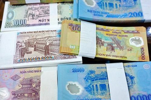 Đổi tiền mới lì xì Tết Nguyên đán 2024 để kiếm lời có vi phạm pháp luật không?