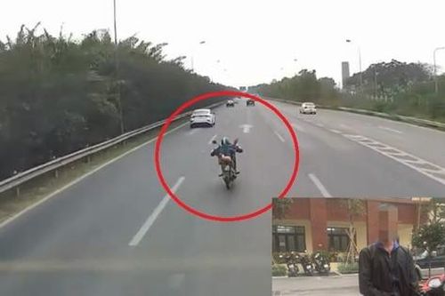 Nam thanh niên 'diễn xiếc' nằm trên xe máy ở Đại lộ Thăng Long khai gì?