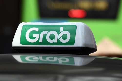 Grab lần đầu tiên báo lãi