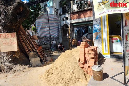 Người dân tháo dỡ nhà, bàn giao mặt bằng để mở đường vào sân bay Tân Sơn Nhất