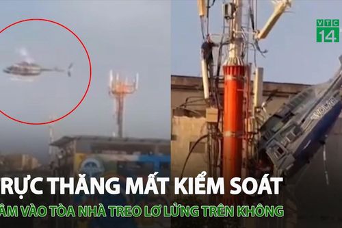 Trực thăng mất kiểm soát tông vào tòa nhà, treo lơ lửng trên không