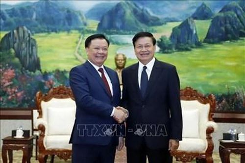Tổng Bí thư, Chủ tịch nước Lào đánh giá cao kết quả hợp tác giữa Hà Nội và Vientiane
