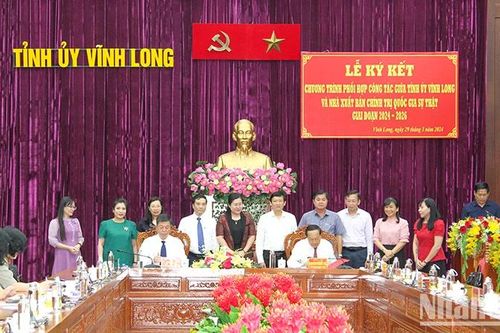 Nhà xuất bản Chính trị quốc gia Sự thật ký kết phối hợp công tác với Tỉnh ủy Vĩnh Long