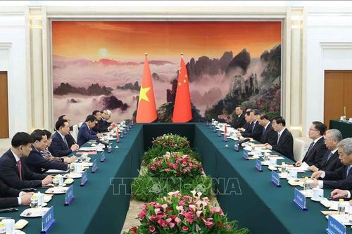 Chủ tịch Quốc hội Vương Đình Huệ hội kiến Chủ tịch Chính hiệp toàn quốc Trung Quốc
