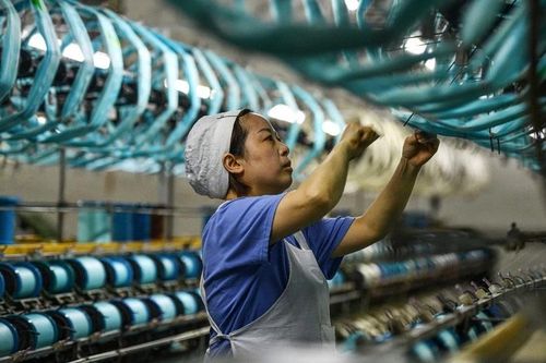 Kinh tế Trung Quốc tăng trưởng cao hơn dự đoán