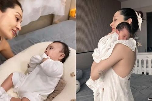 Bảo Anh khoe khoảnh khắc chơi đùa cùng con gái hồi một tháng tuổi