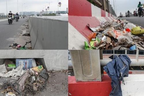 Hà Nội: Rác thải ngập ngụa bịt kín rãnh thoát nước trên cầu Vĩnh Tuy