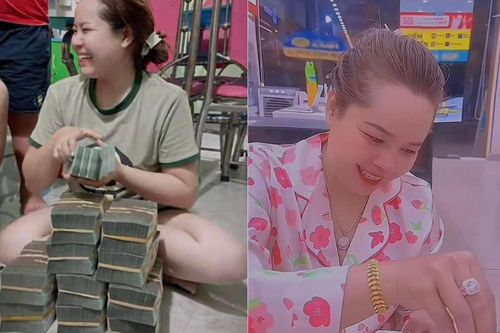 Chị gái đang bán hàng thì tự nhiên dò số trúng độc đắc