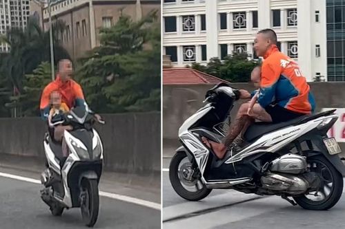 Xác minh nam thanh niên bế em bé, chạy xe máy lên đường Vành đai 3 trên cao