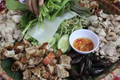 Lạ miệng với mâm cỗ thịt heo rừng lai