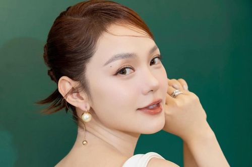 Vóc dáng thon gọn của 'gái một con' Minh Hằng