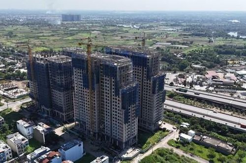 Khó giảm giá nhà ở vì tiền sử dụng đất cao