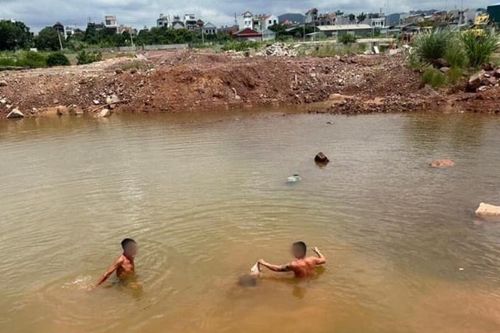 Tìm thấy thi thể 2 chị em trong ao nước dự án tái định cư