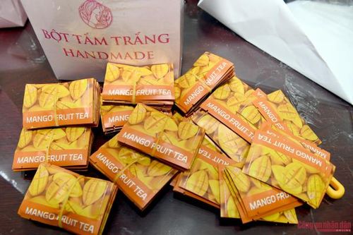 Cận cảnh ma túy nước vui 'trà xoài' ngụy trang trong bột tắm trắng để vận chuyển