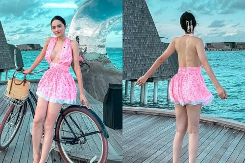 Hương Giang diện váy khoét trước hở sau