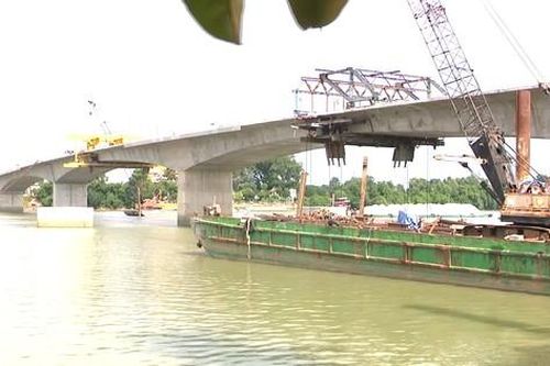 Hình hài cầu bắc qua sông nối Bình Dương và Đồng Nai giai đoạn hợp long