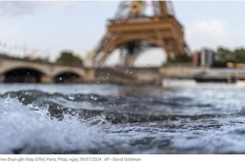 Nắng nóng ở Paris khiến làng Thế Vận thiếu máy lạnh. Sông Seine vẫn đục, không thể thi đấu